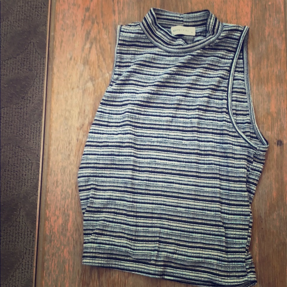 A sleeveless knit shirt